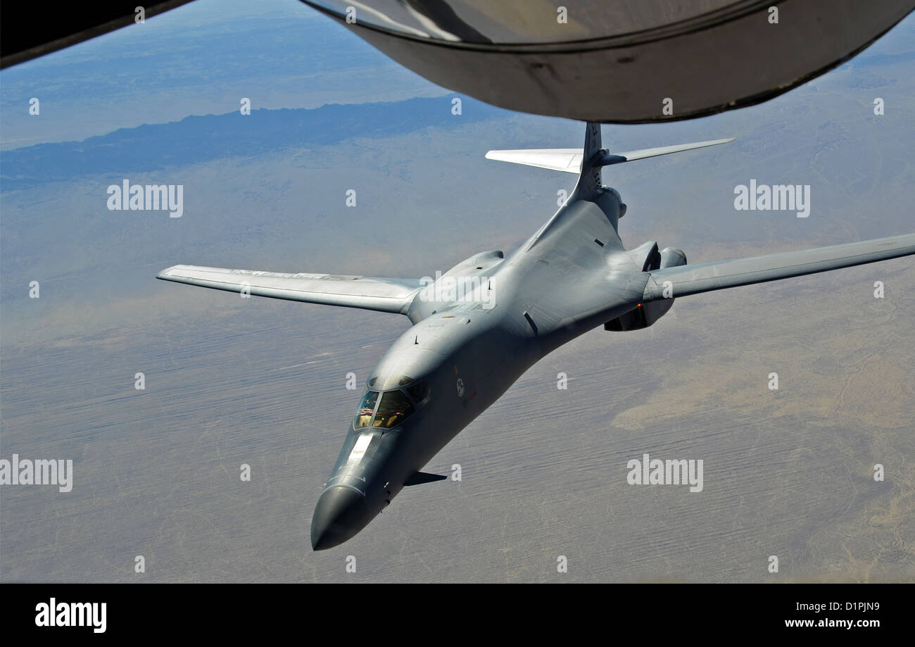 A B-1B Lancer, deployed from Ellsworth Air Force Base, S.D., prepares to be refueled over Afghanistan, Dec. 22. The B-1B flew 26 U.S. flags over Afghanistan for the Sandy Hook Elementary School shooting in Connecticut while conducting missions in support Stock Photo