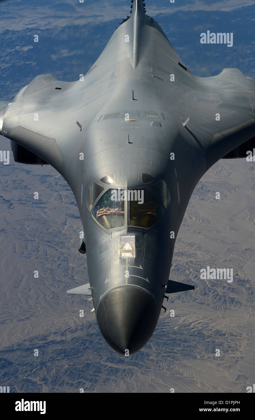 A B-1B Lancer, deployed from Ellsworth Air Force Base, S.D., prepares to be refueled over Afghanistan, Dec. 22. The B-1B flew 26 U.S. flags over Afghanistan for the Sandy Hook Elementary School shooting in Connecticut while conducting missions in support Stock Photo