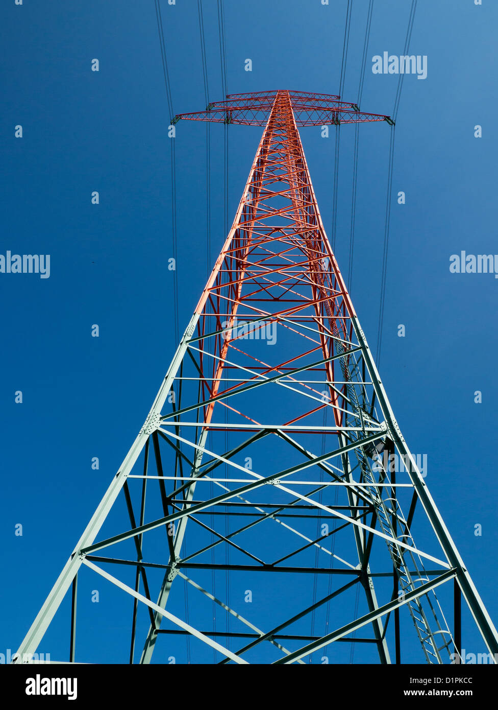 High voltage power line spanning the River Elbe in the Elbmarsch near Hamburg, Germany. Stock Photo