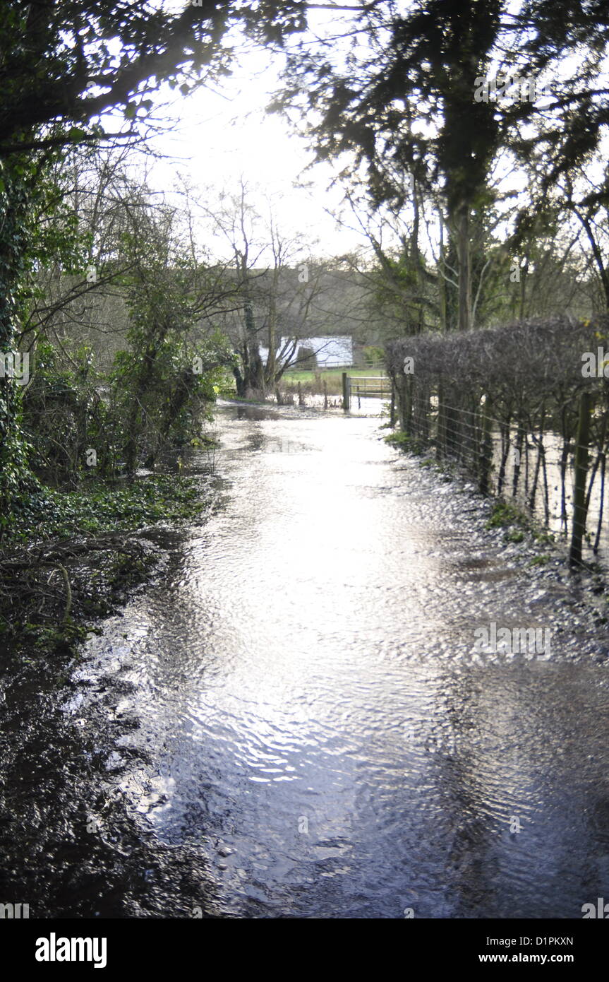 Ramsbury, Wiltshire, UK. 1st January 2013. the River Kennet Tributory bursting its banks in Ramsbury, Wiltshire picture by Graham Finney celebrityphotos uk Stock Photo