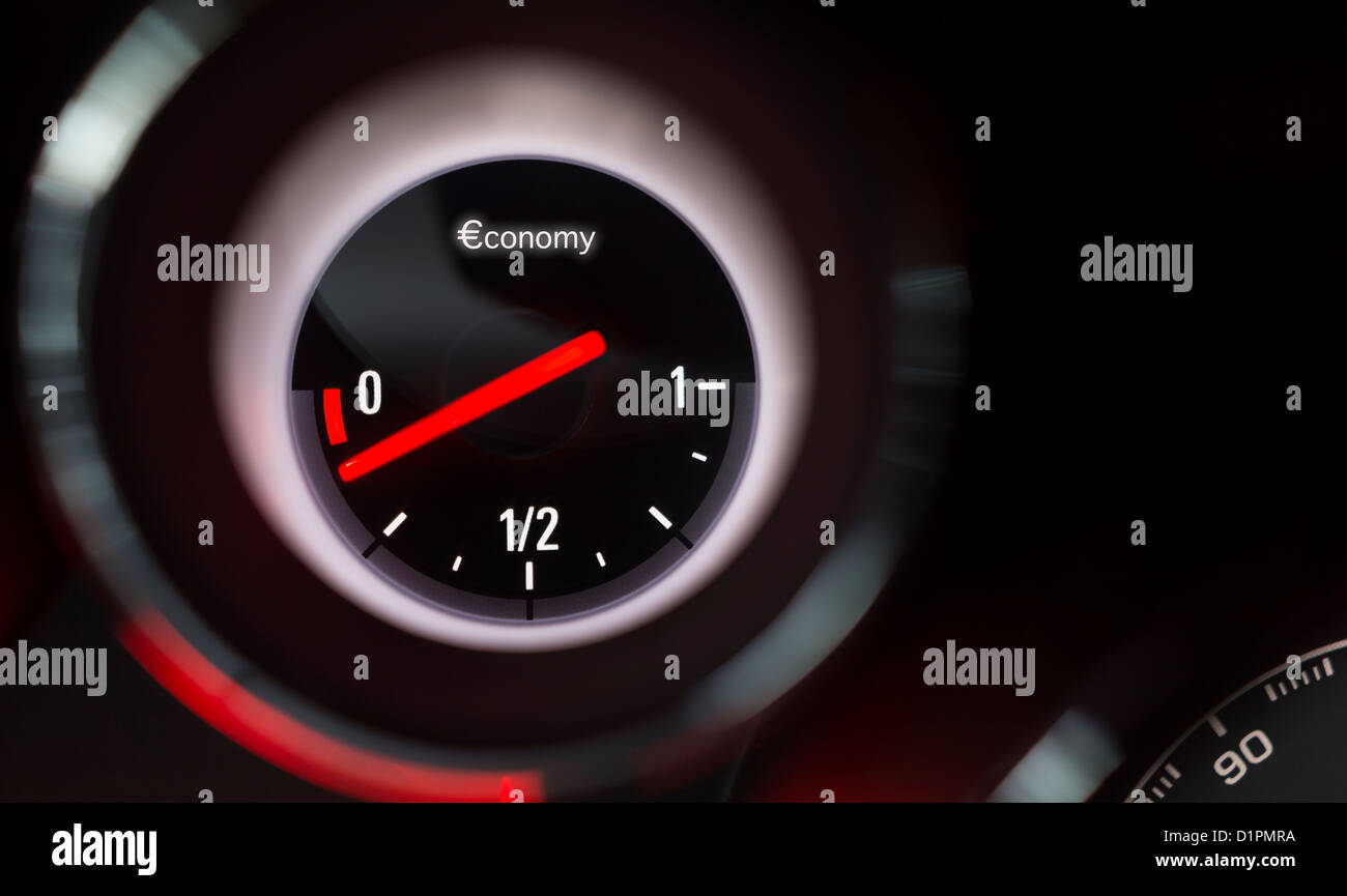 Economy fuel gauge nearing empty Stock Photo Alamy