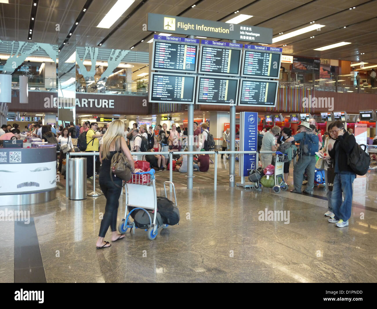 changi airport interior passengers Stock Photo