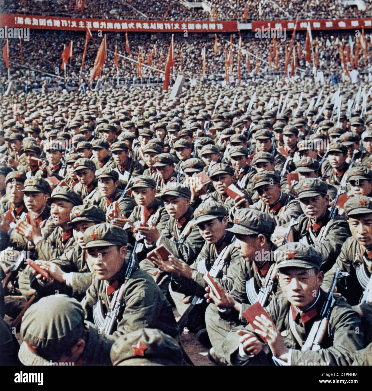 Red Guards at Rally Reading Mao Zedong's Little Red Book, Beijing, China, 1966 Stock Photo