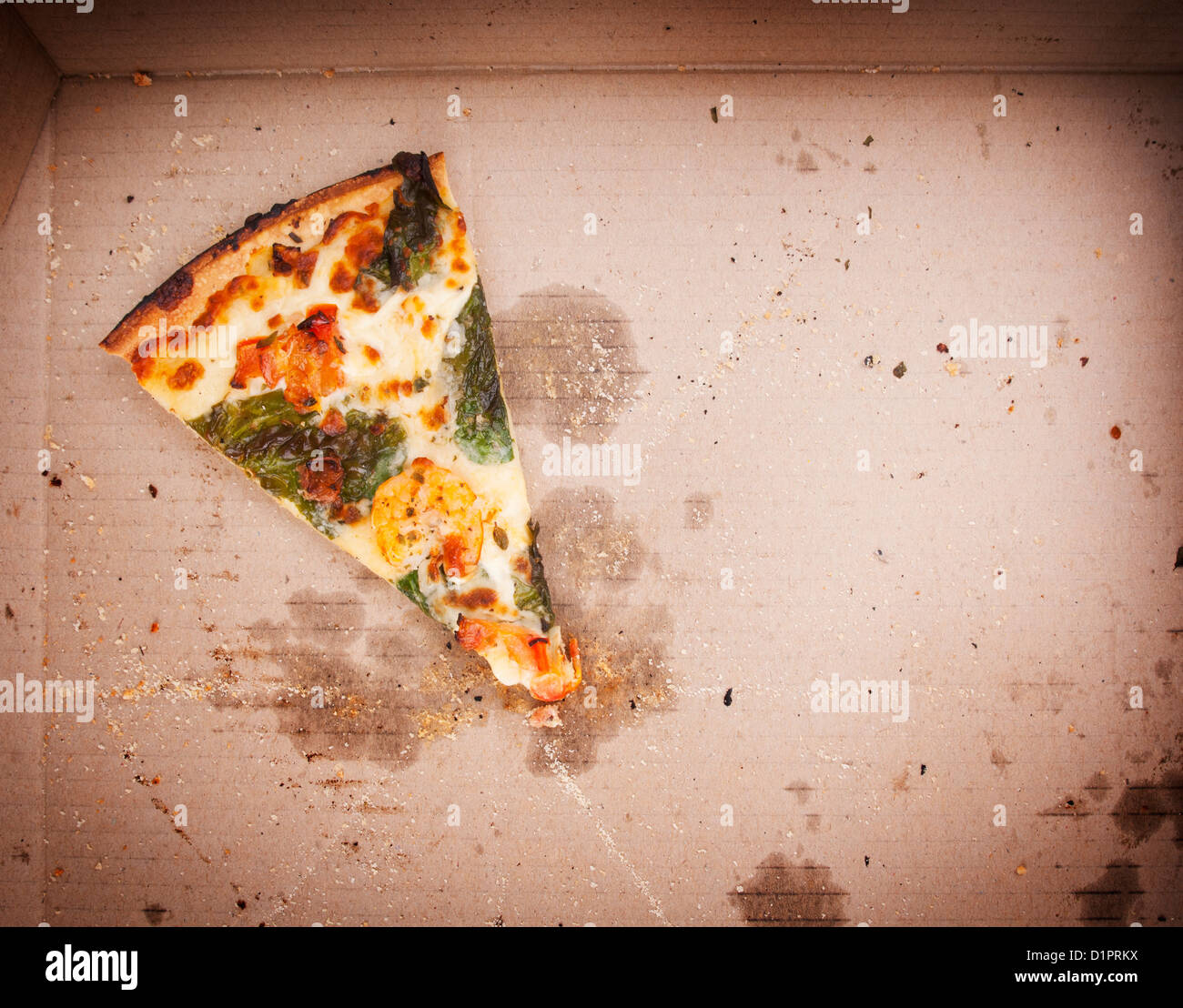 Pizza slice last one left in the pizza box Stock Photo Alamy