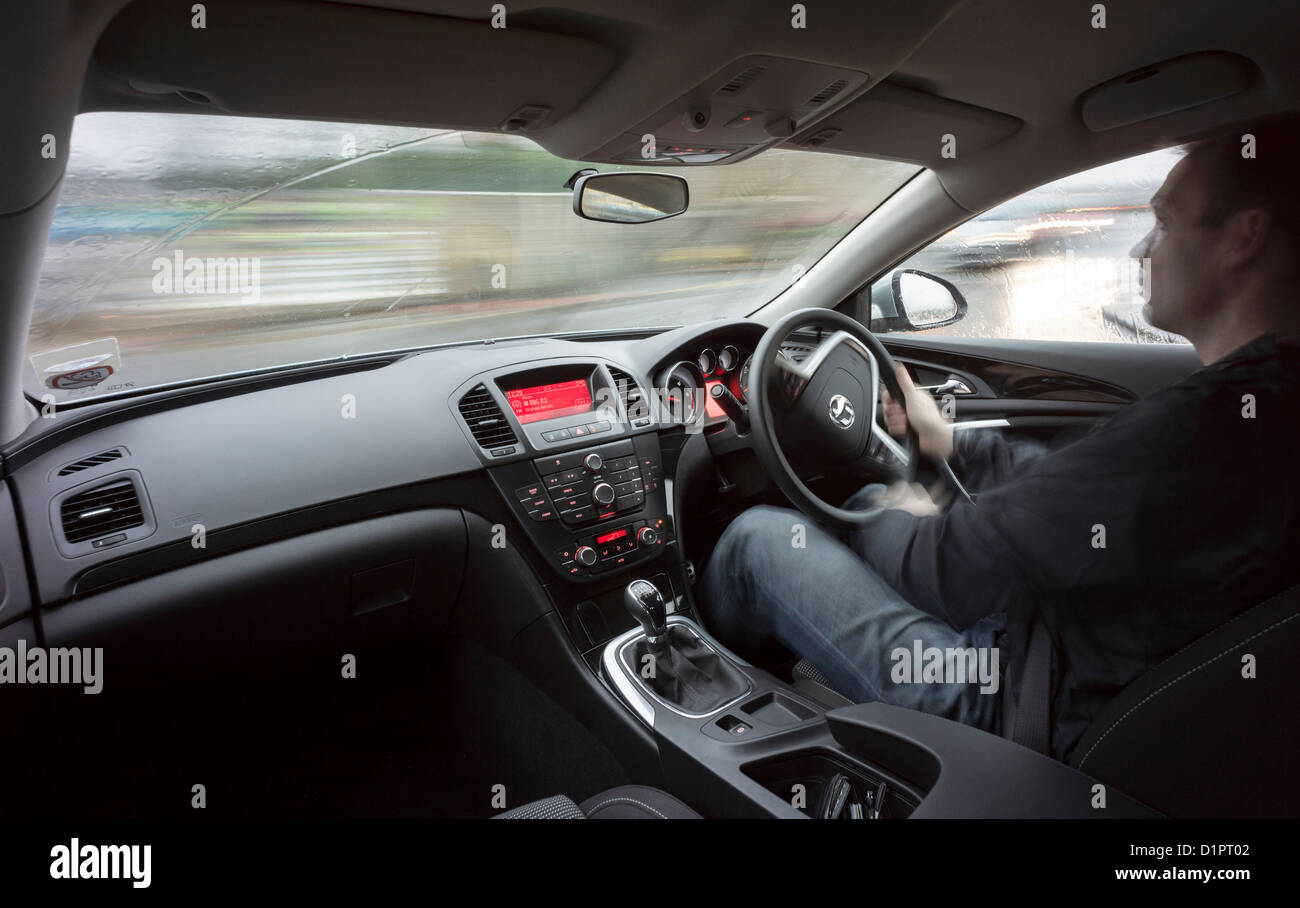 A car goes into a spin in poor weather conditions from inside the car. Stock Photo