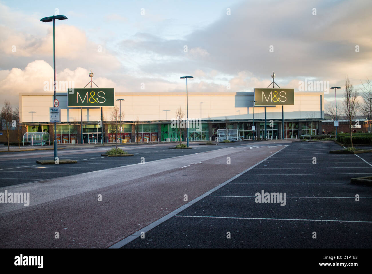 Closed Marks and Spencer and empty car park Longwell Green Retail Park