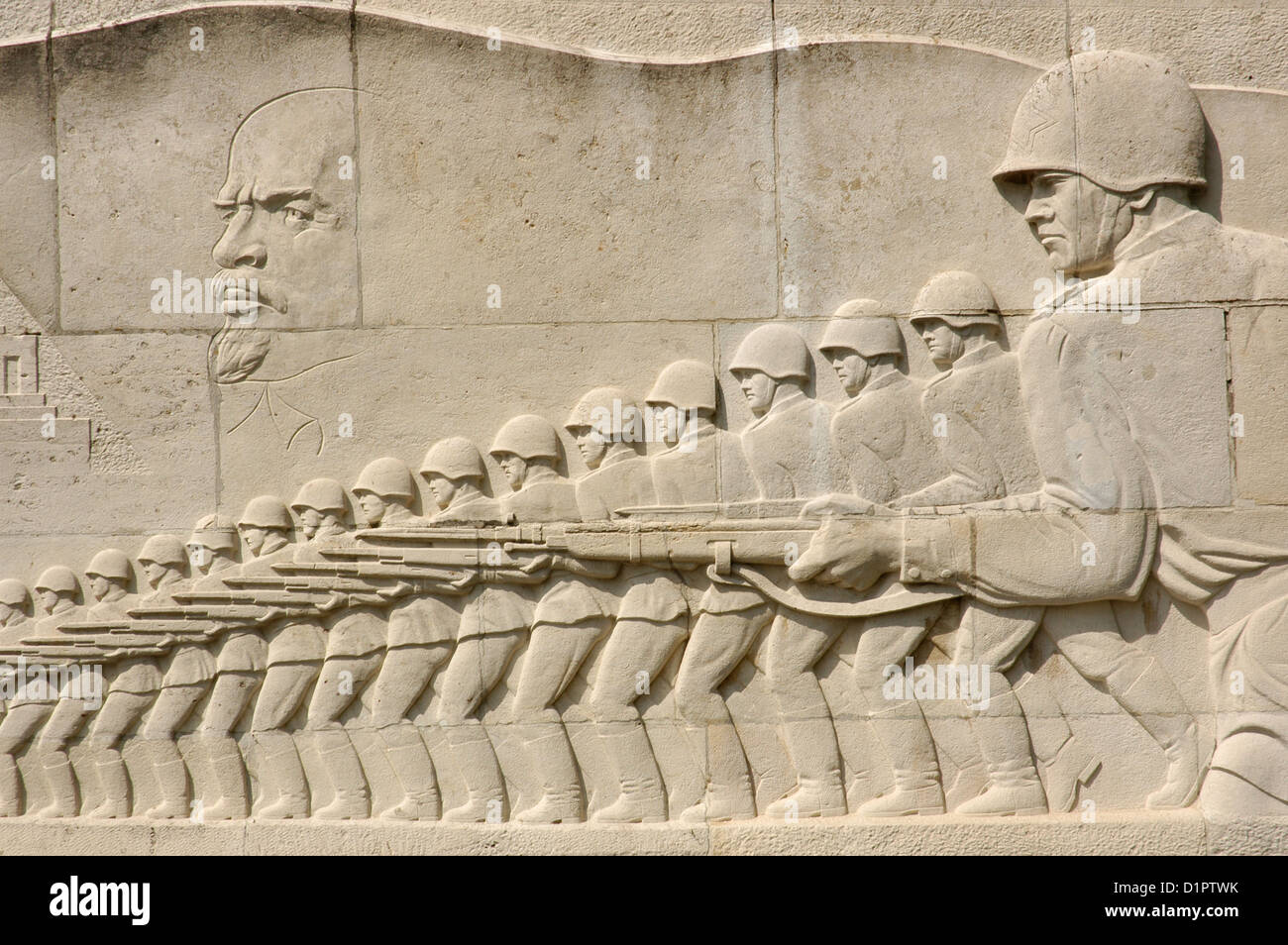 Sarcophagus with relief carving a military scene of soldiers of the Red Army and portrait of Lenin. Treptower Park. Berlin. Stock Photo