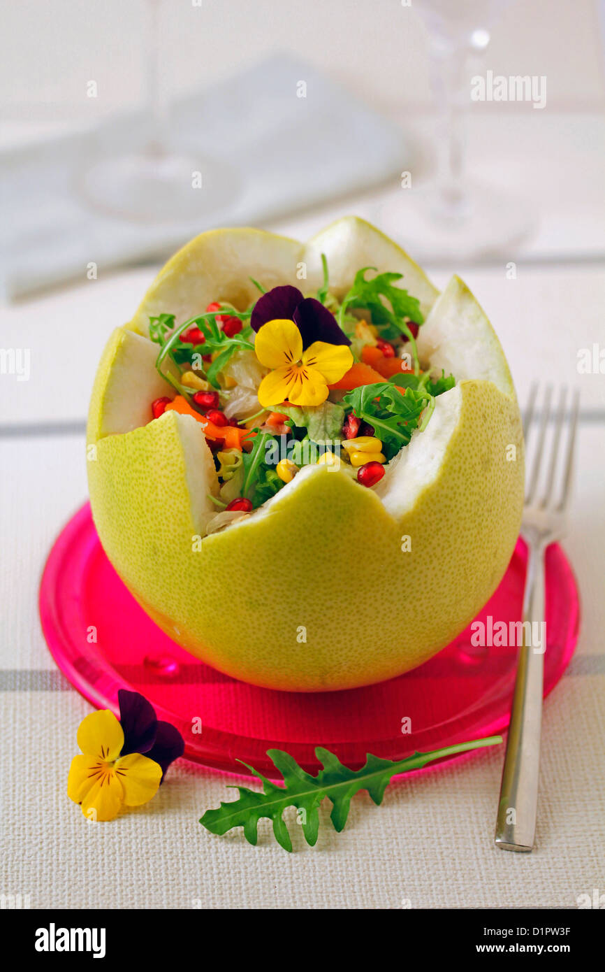 Stuffed grapefruit with salad. Stock Photo