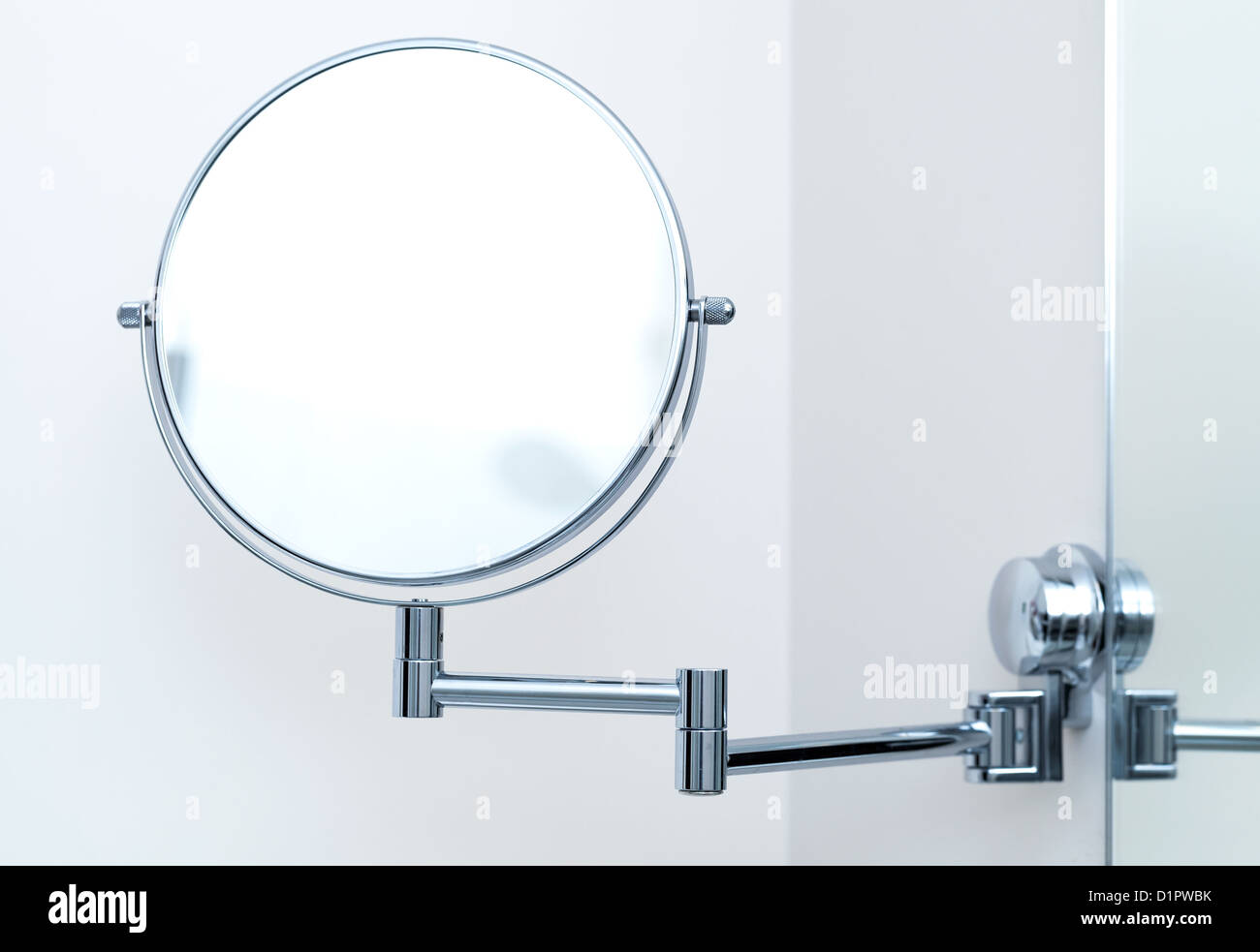 Round wall mirror for the bath. Close-up photo Stock Photo - Alamy
