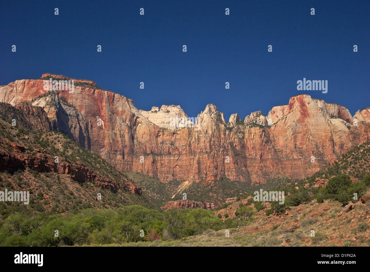 West Temple, the Sundial, and the Altar of Sacrifice rise dramatically from Zion Canyon's floor, Zion National Park, Utah, USA Stock Photo