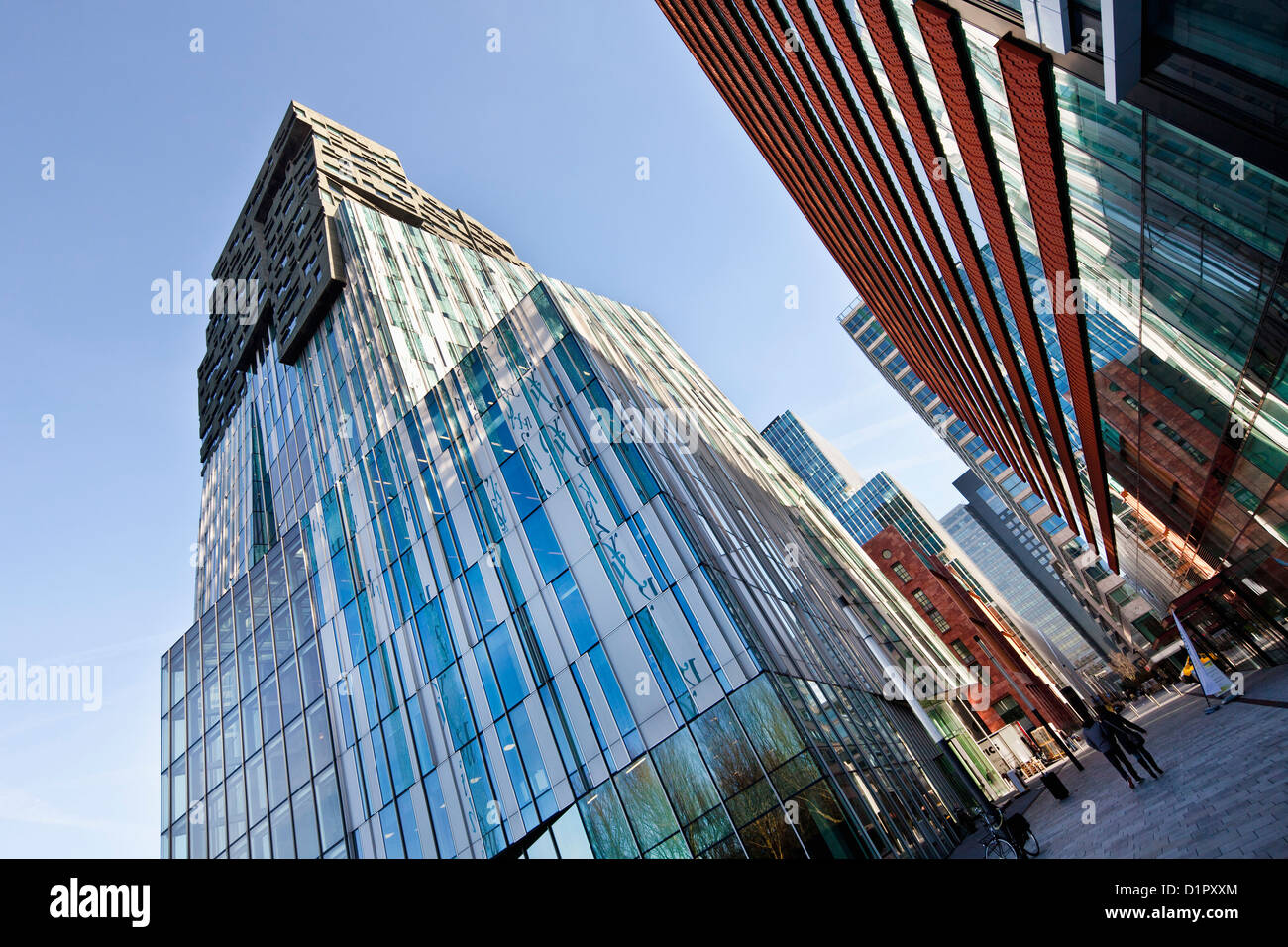 The Netherlands, Amsterdam, Business district called Zuidas. left building called The Rock. Stock Photo
