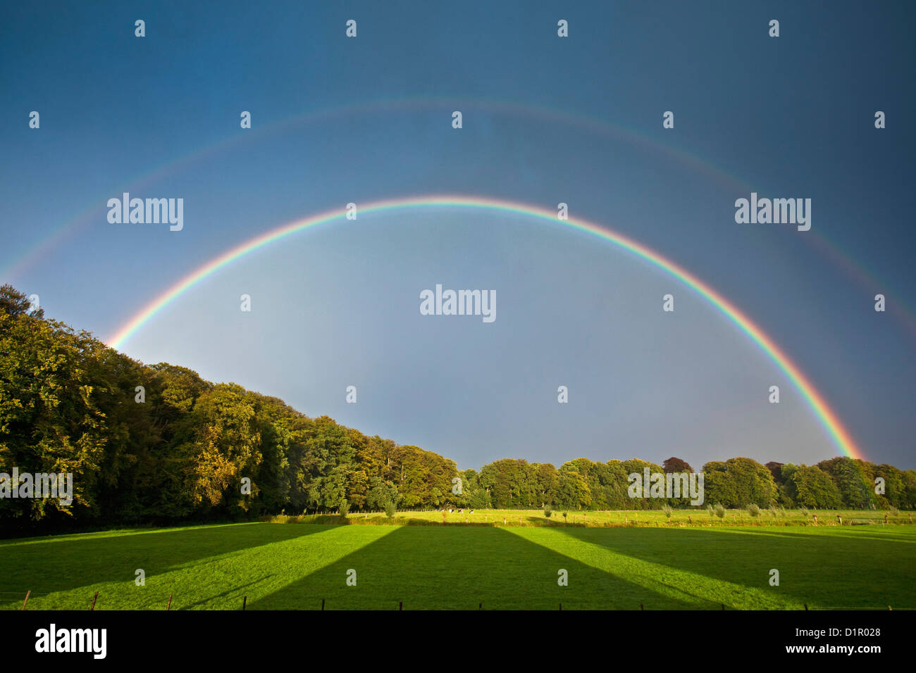 The Netherlands, 's-Graveland. Rural estate called Hilverbeek. Double rainbow. Stock Photo
