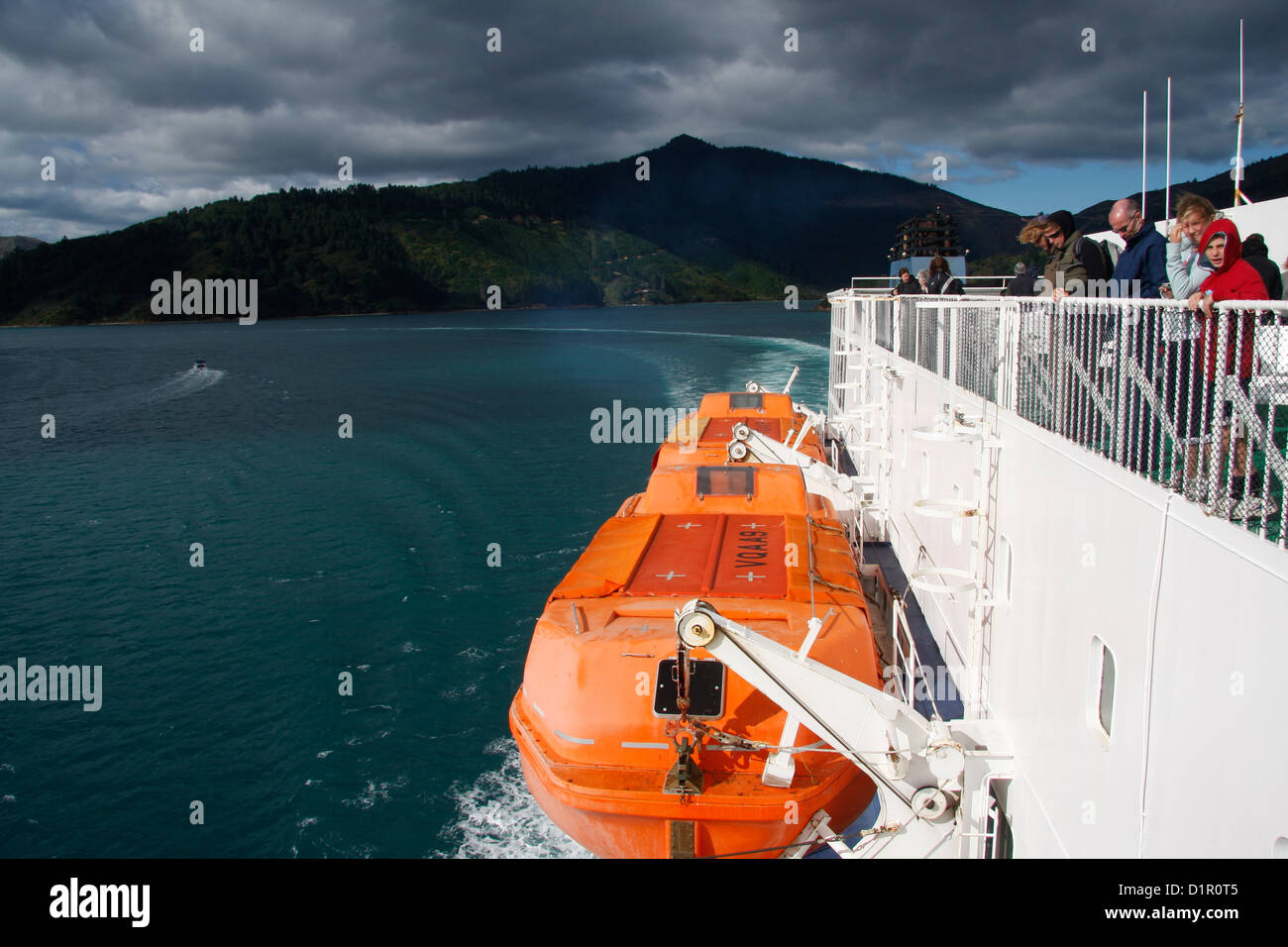 An Interislander ferry with liveboats attached, passes through