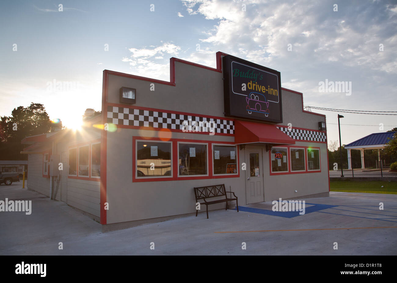 Sun sets behind an American diner in rural Louisiana Stock Photo