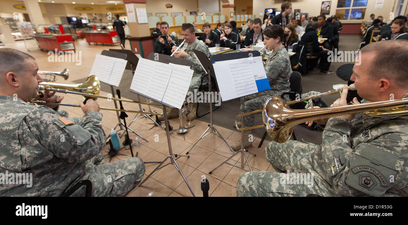 The U.S. Army Field Band’s brass quintet performed at the Fort Sam Houston dining facility for the All-American Marching Band, Jan 2. Later in the day the soldiers of the U.S. Army Field Band will be conducting mentoring and clinic sessions with the All-American Marching Band members. (Photo by Jonathan E. Agee) Stock Photo