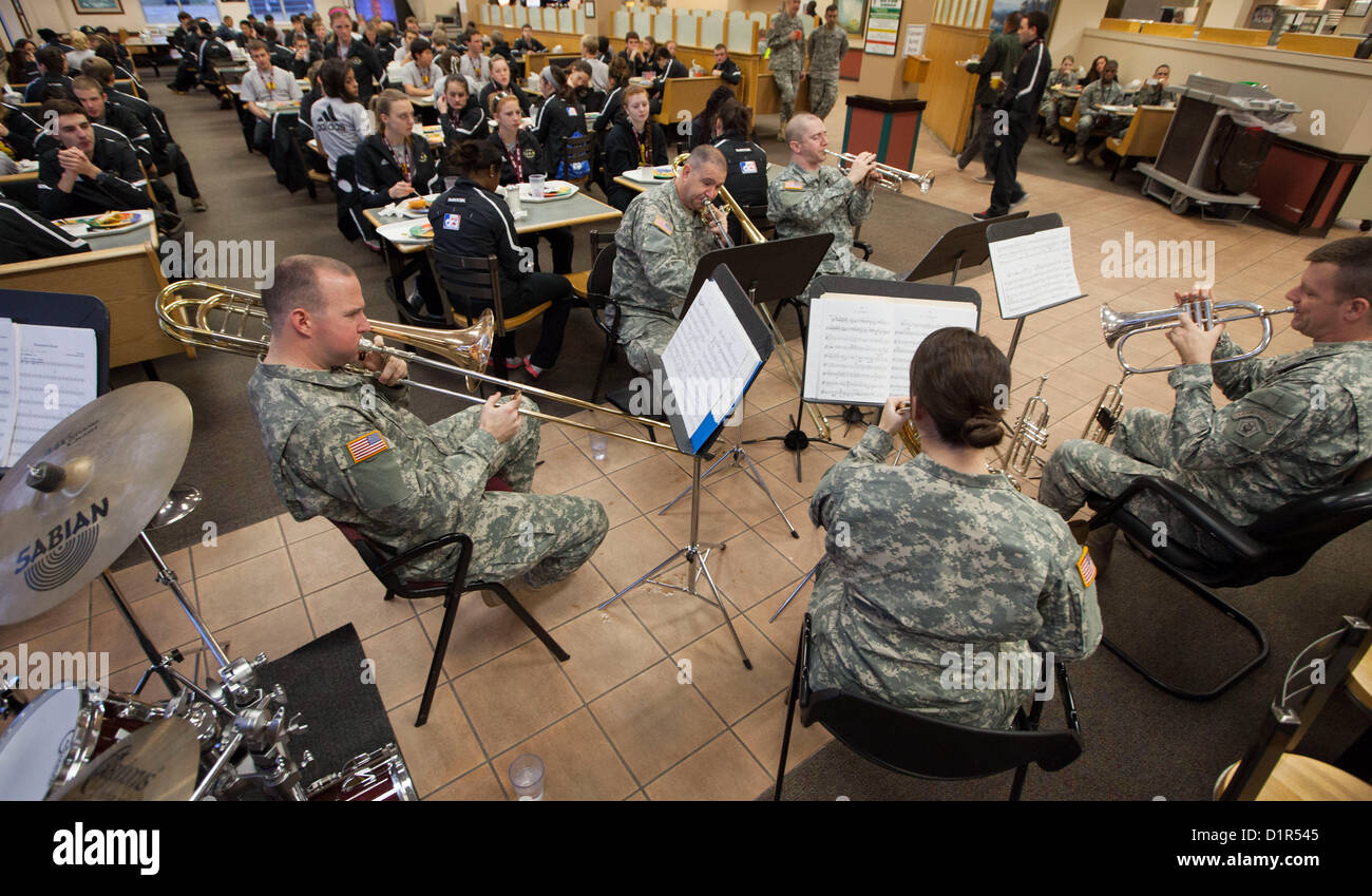 The U.S. Army Field Band’s brass quintet performed at the Fort Sam Houston dining facility for the All-American Marching Band, Jan 2. Later in the day the soldiers of the U.S. Army Field Band will be conducting mentoring and clinic sessions with the All-American Marching Band members. (Photo by Jonathan E. Agee) Stock Photo