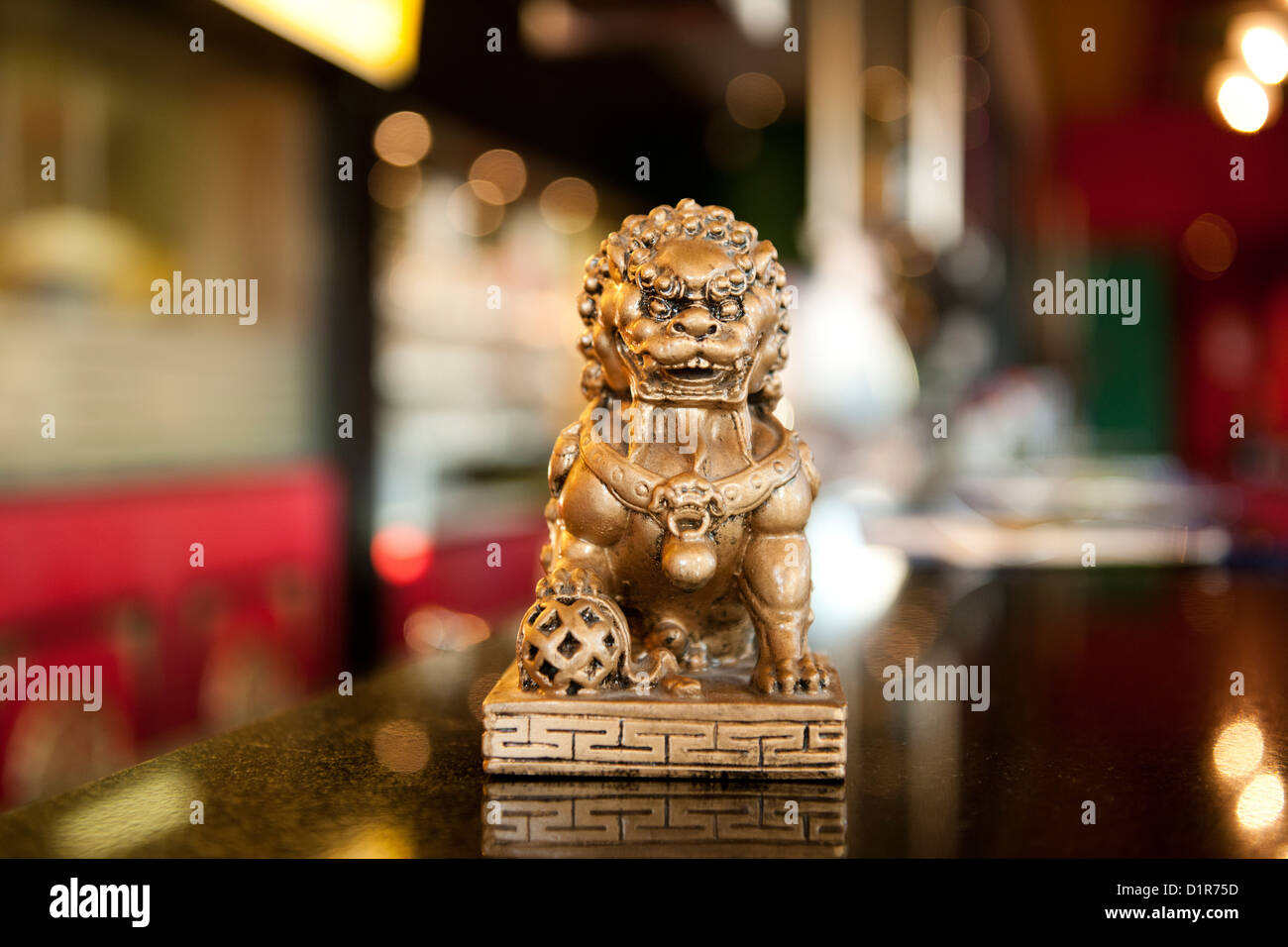 small chinese lion statue in a china restaurant Stock Photo Alamy
