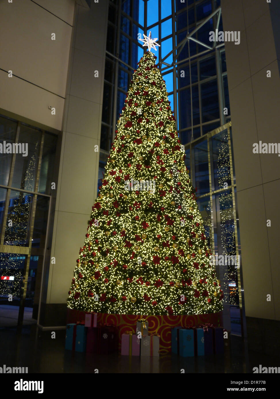 tall indoor christmas tree office building Stock Photo