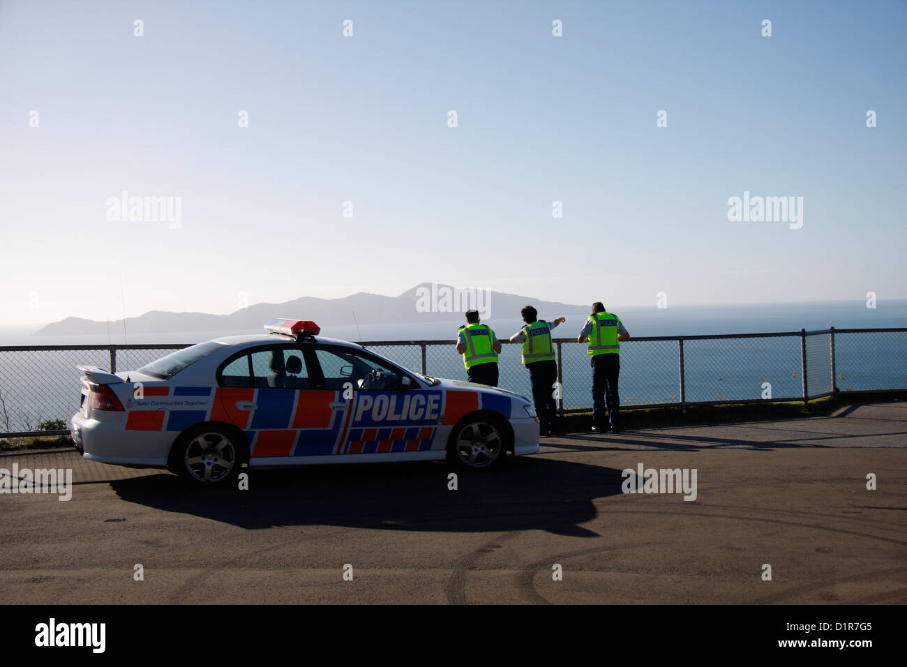 Three police officers on duty in Paraparaumu, New Zealand. Stock Photo