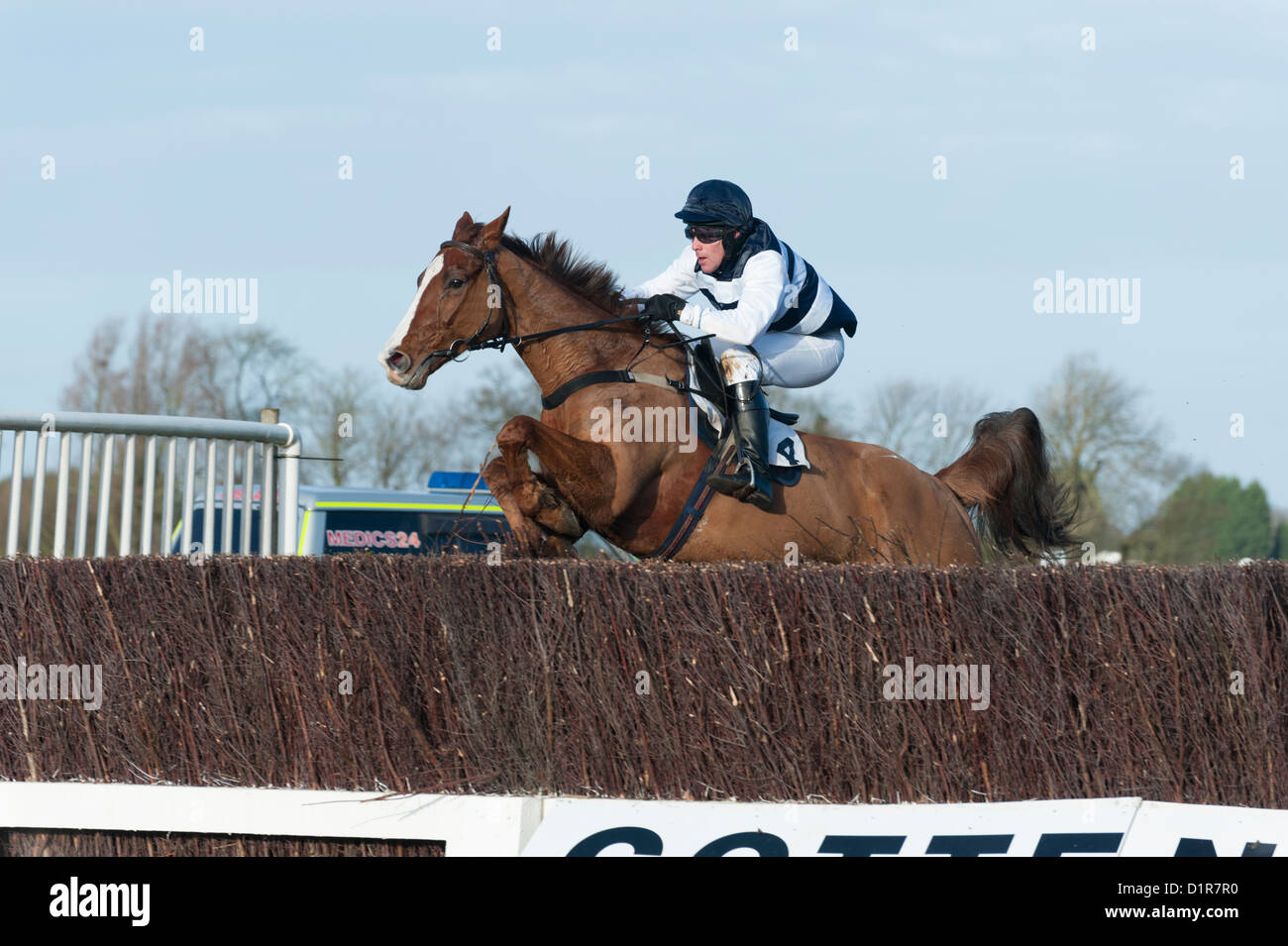 Horse and rider jump a fence at Cottenham PointtoPoint races