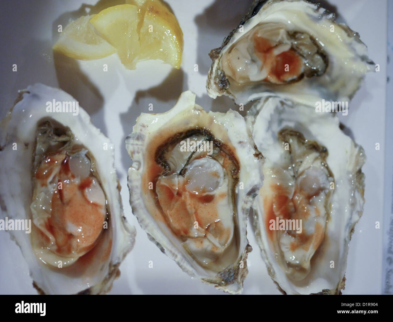 raw oysters Tabasco sauce Stock Photo Alamy