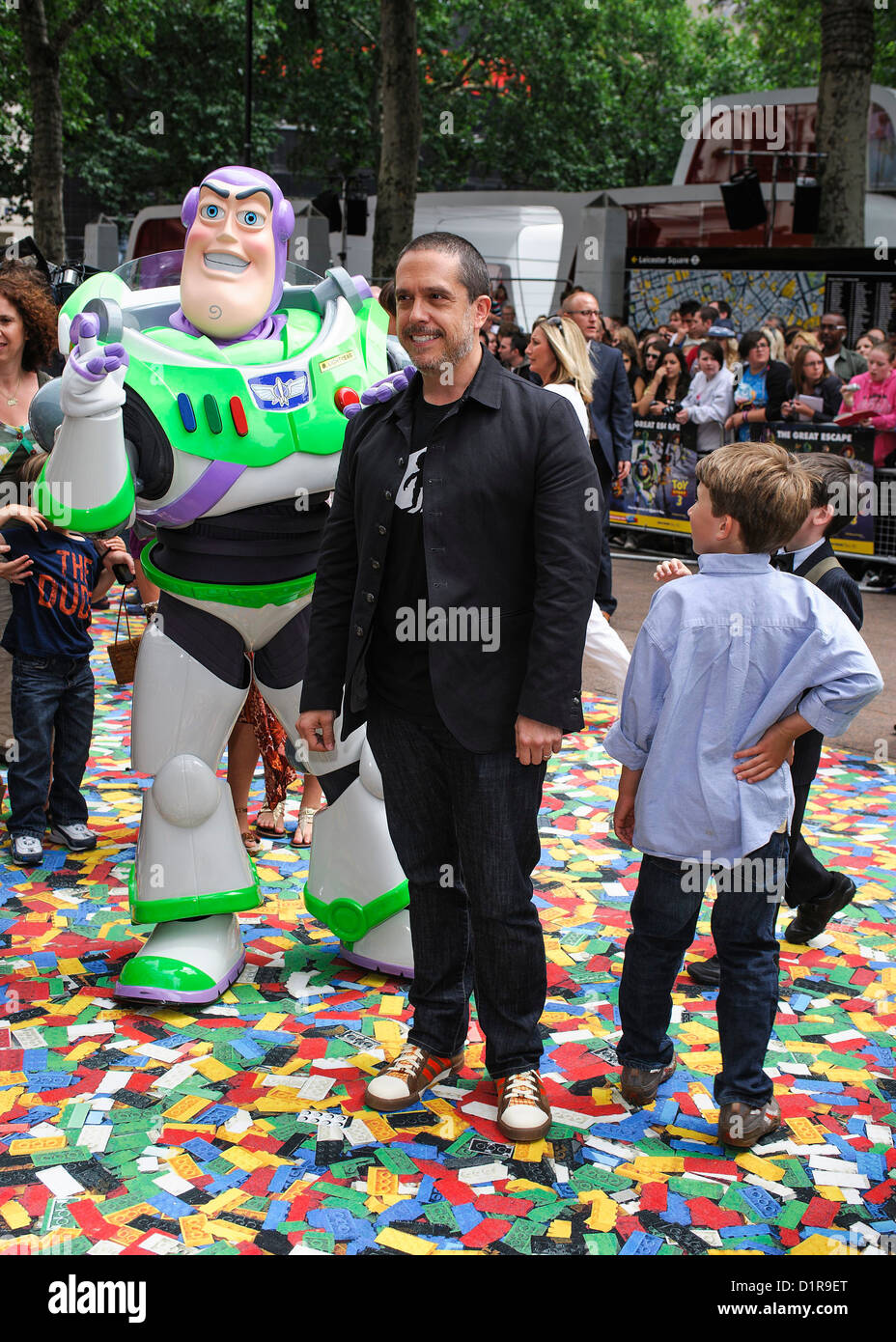 Buzz Lightyear and Director Lee Unkrich attends the Uk Premiere of Toy Story 3 at The Empire Leicester Square, London, 18 July 2010. Picture by Julie Edwards. Stock Photo