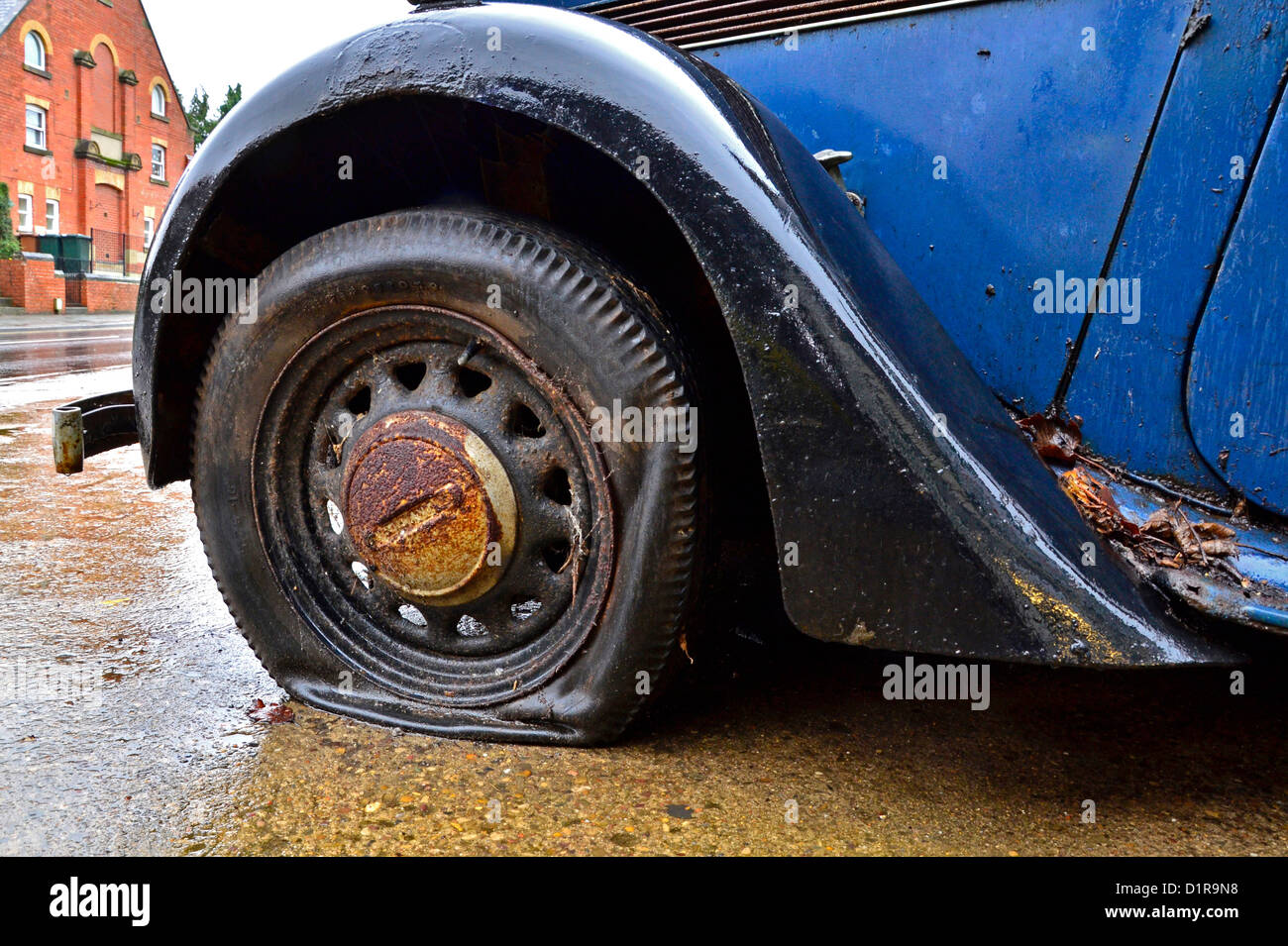 Blue Barn Find Classic Car With Flat Tyre Stock Photo Alamy