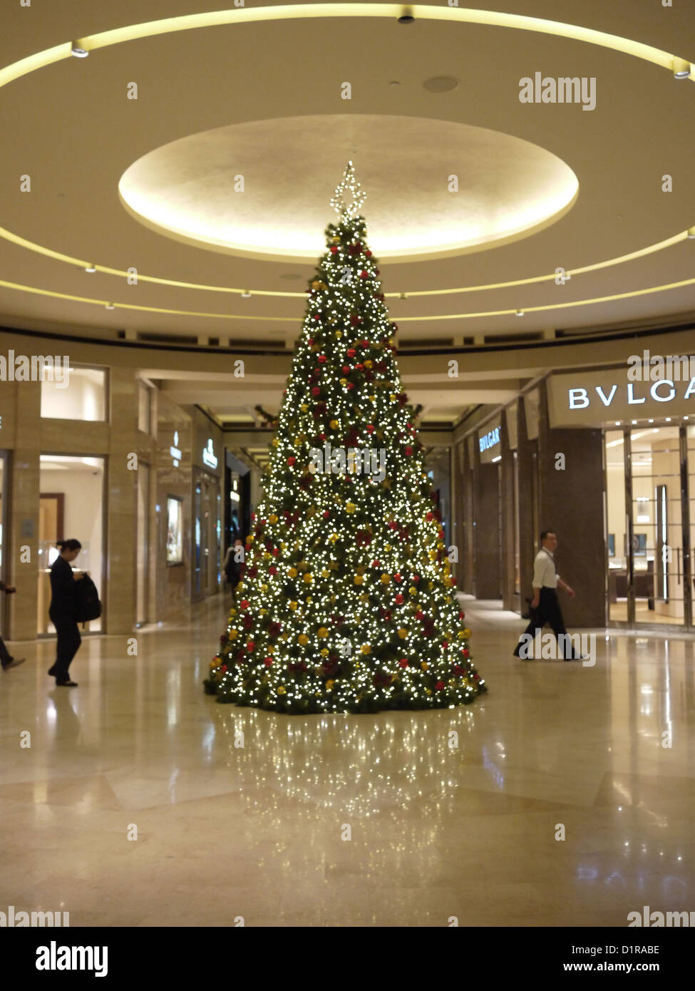 tall Christmas tree inside shopping mall Stock Photo