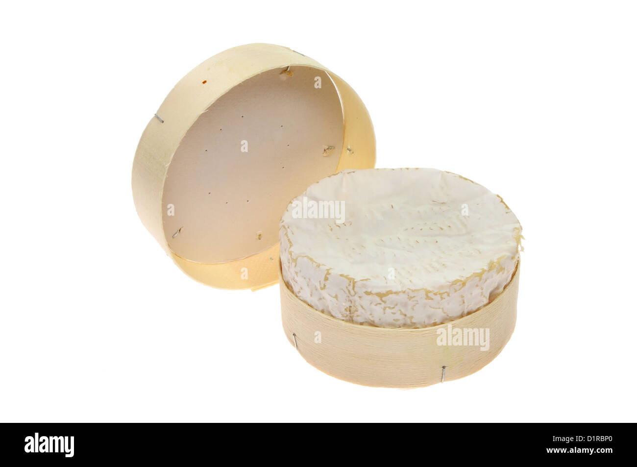 Camembert cheese and packaging isolated against white Stock Photo