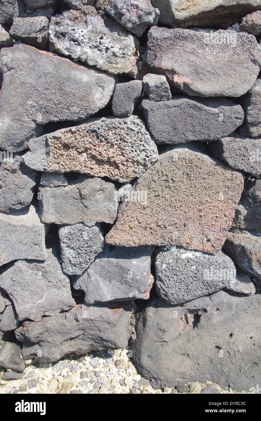 Detail, dry built lava stone wall at Ke'eku Heiau , pre-christian temple near Kahalu'u Bay, Hawaii  Stock Photo