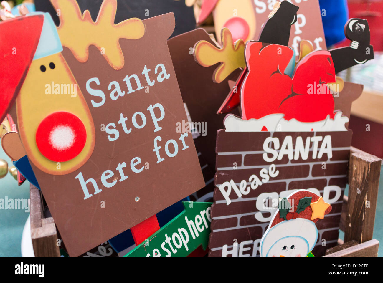 Festive Santa Stop Here signs. Stock Photo
