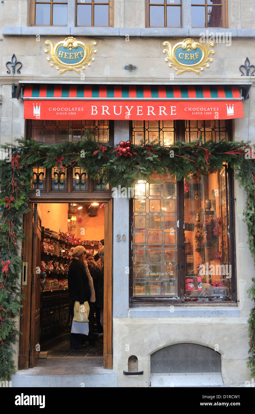 A Belgian chocolate shop at Christmas time, in the corner of the Grand Place, Brussels, Belgium Stock Photo