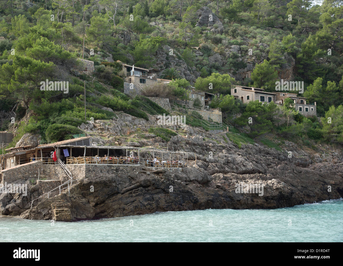 Cala Deia is a small bay with a little beach and two restaurants. This one is Ca's Patro March Stock Photo