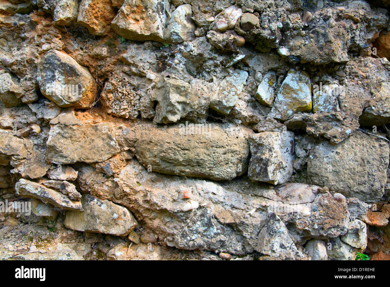 A old stone garden wall as background Stock Photo - Alamy