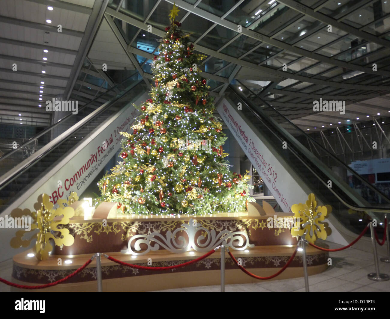 tall Christmas tree indoor escalator Stock Photo