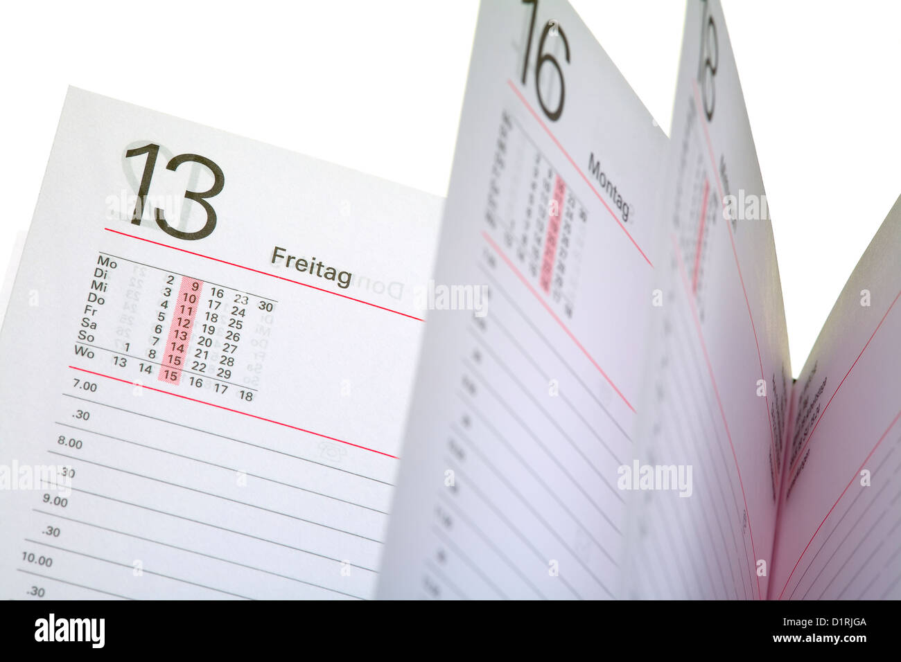 Close up of a open diary - 13 friday (german - Freitag), isolated on white background Stock Photo