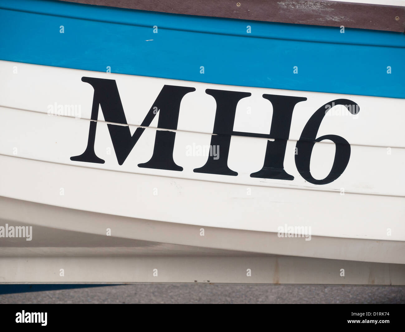 Fishing boats are registered with letters indicating original port of