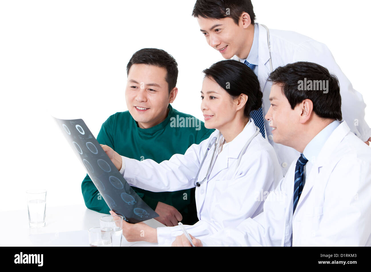 Professional medical team analyzing X-ray plate Stock Photo - Alamy