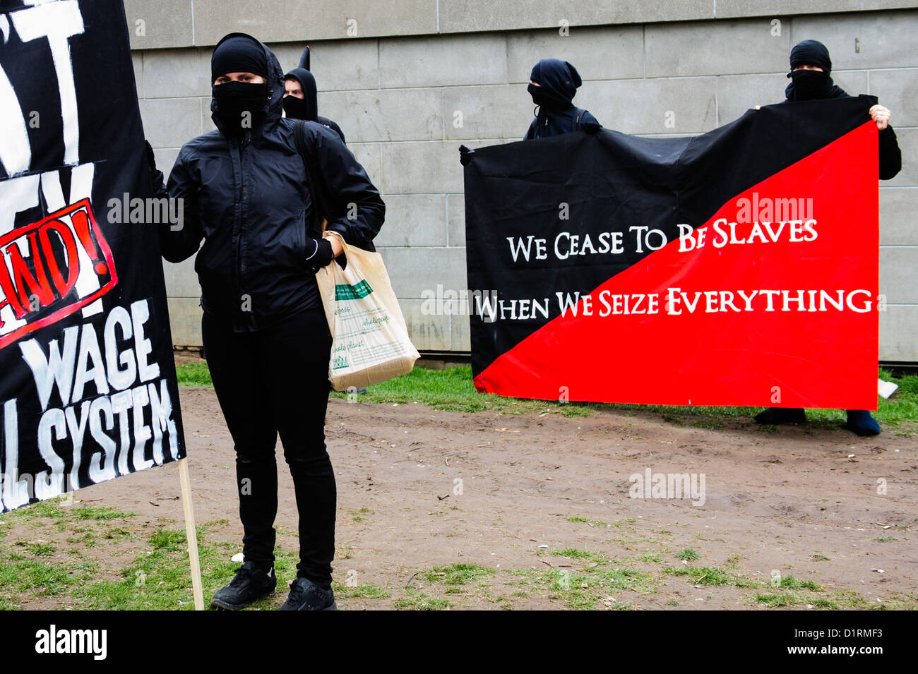 masked-anarchists-participated-in-the-may-day-re-occupy-toronto-march-D1RMF3.jpg