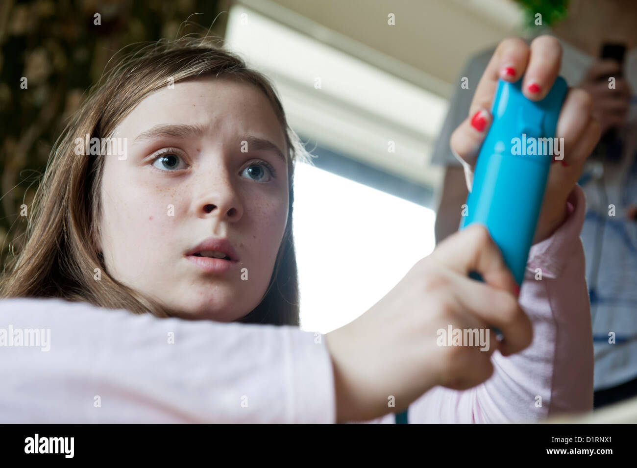 A family plays on their Nintendo Wii games console. Christmas time 2012  Stock Photo - Alamy