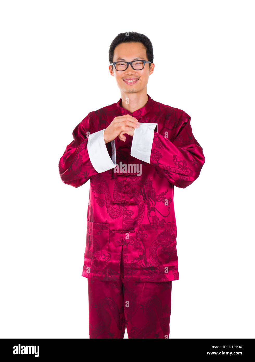 chinese man in traditional suit in chinese greeted isolated in white Stock Photo