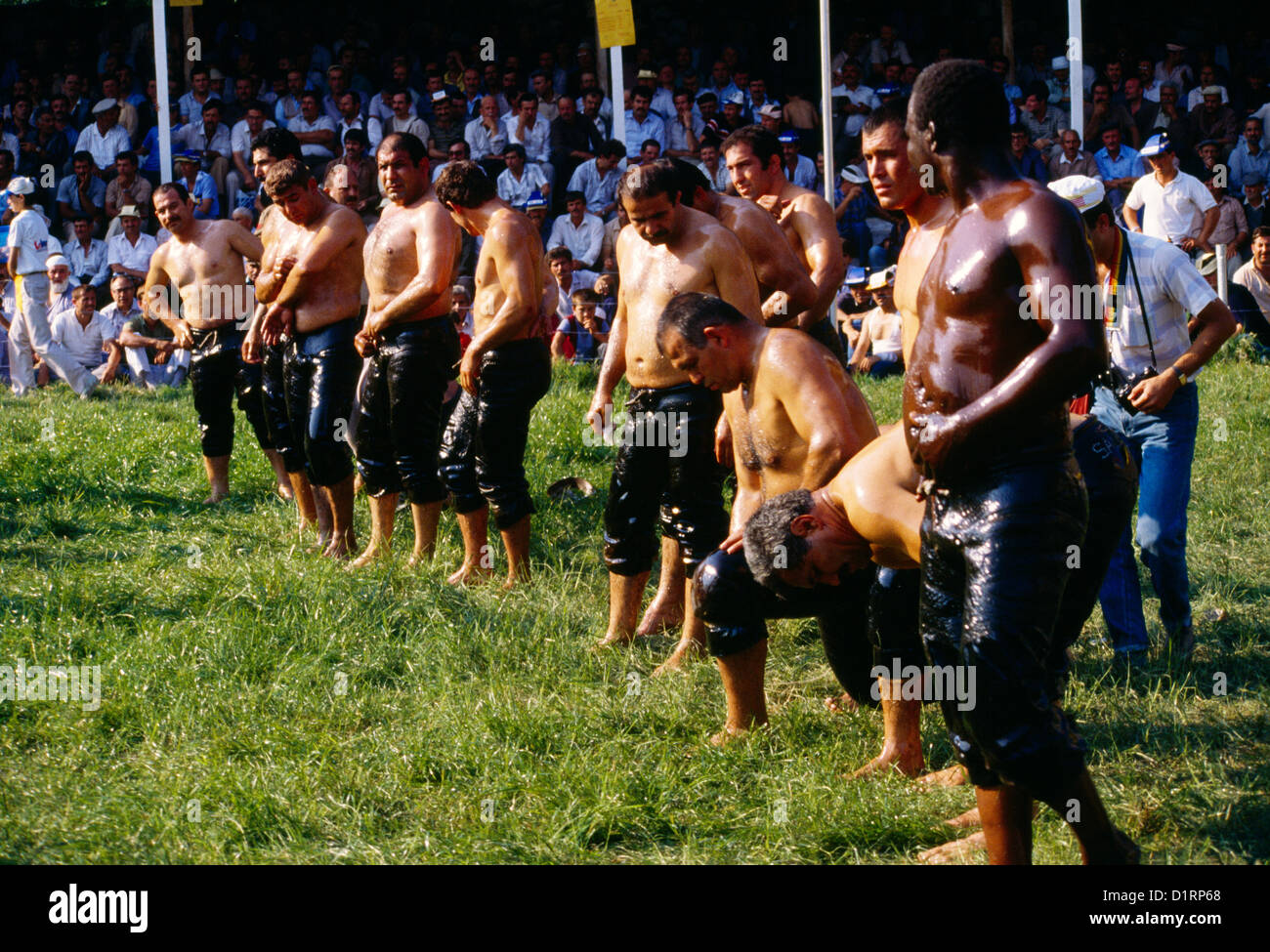 Edirne Turkey Men Covering Themselves In Olive Oil For Yagli Gures At Kirkpinar Tournament Held Annually Since 1362 Oldest Continuous Sporting Competition Stock Photo