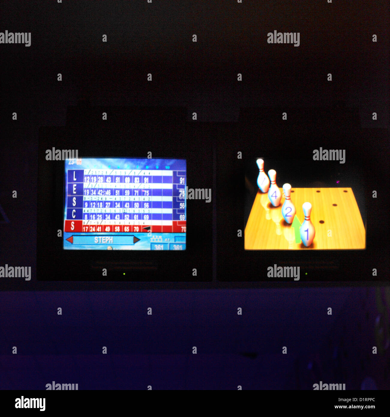 Bowling Alley with Bowling Scores on Monitors Stock Photo - Alamy