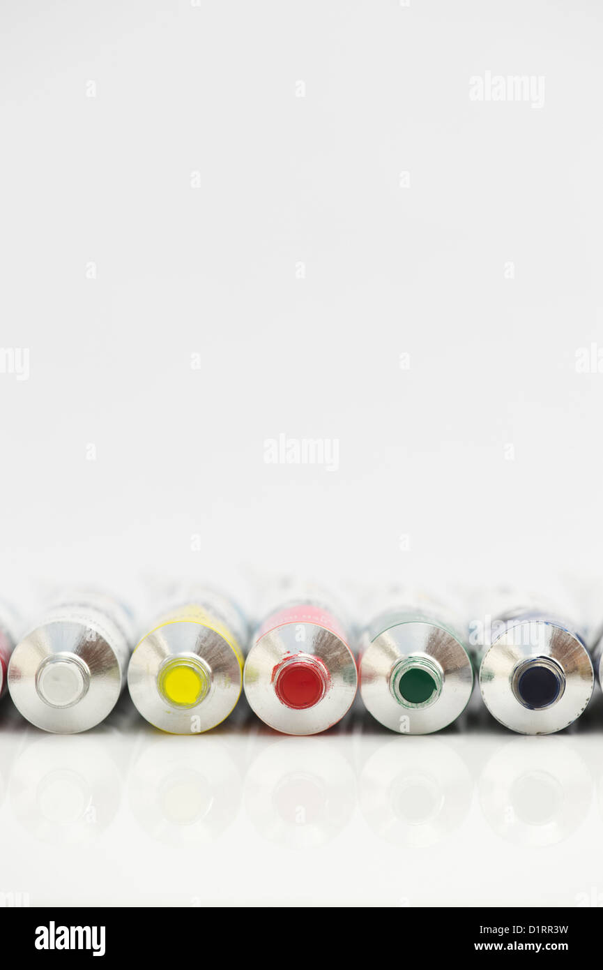 Artists acrylic paint tubes on white Stock Photo