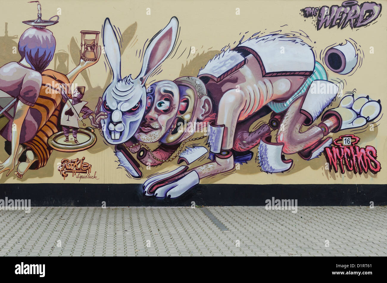 Alice in Wonderland Mural Painting in Arndt Strasse Bielefeld Germany Stock Photo