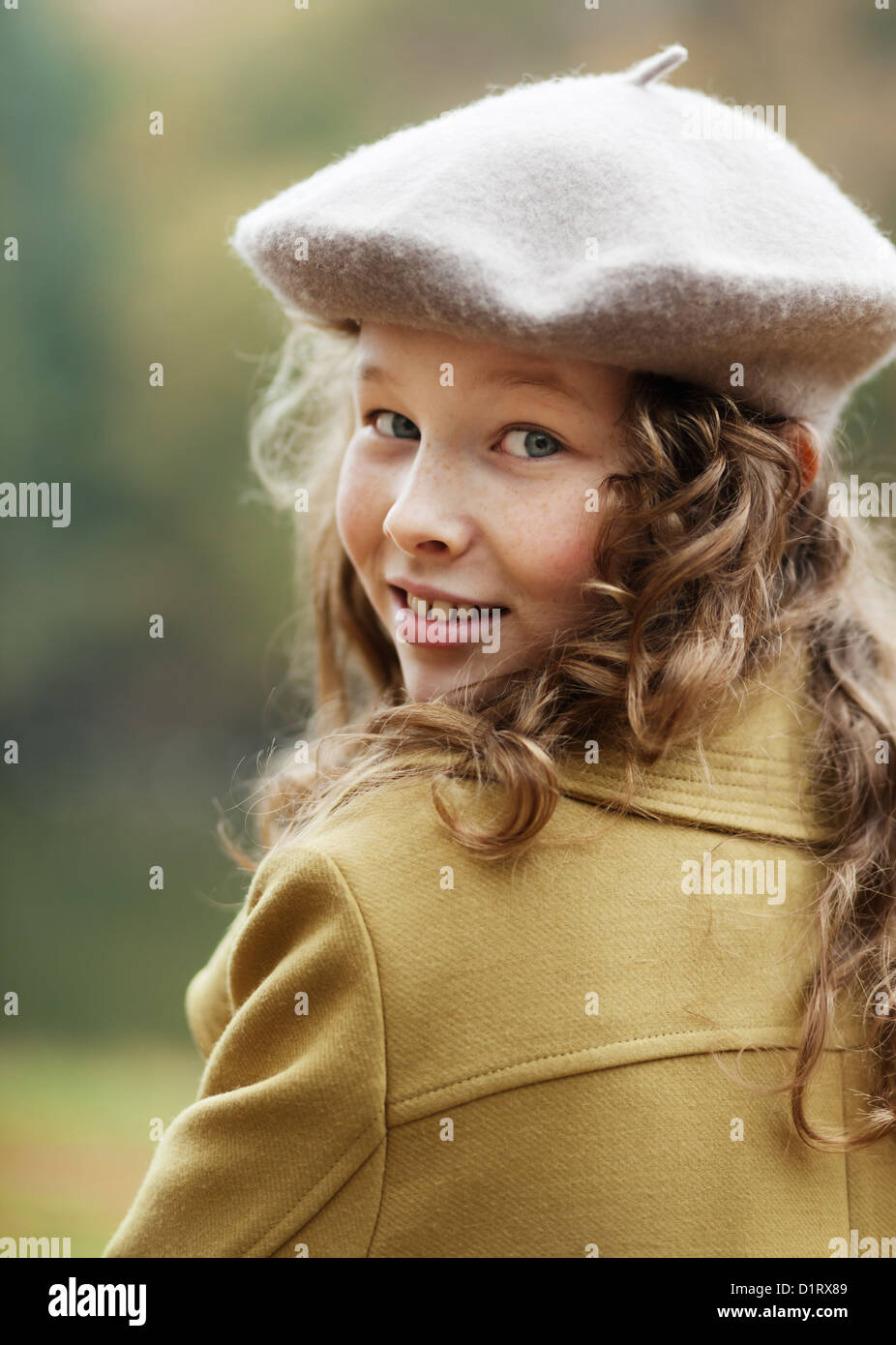 Portrait of blond teenager girl in grey beret in an autumn park Stock ...