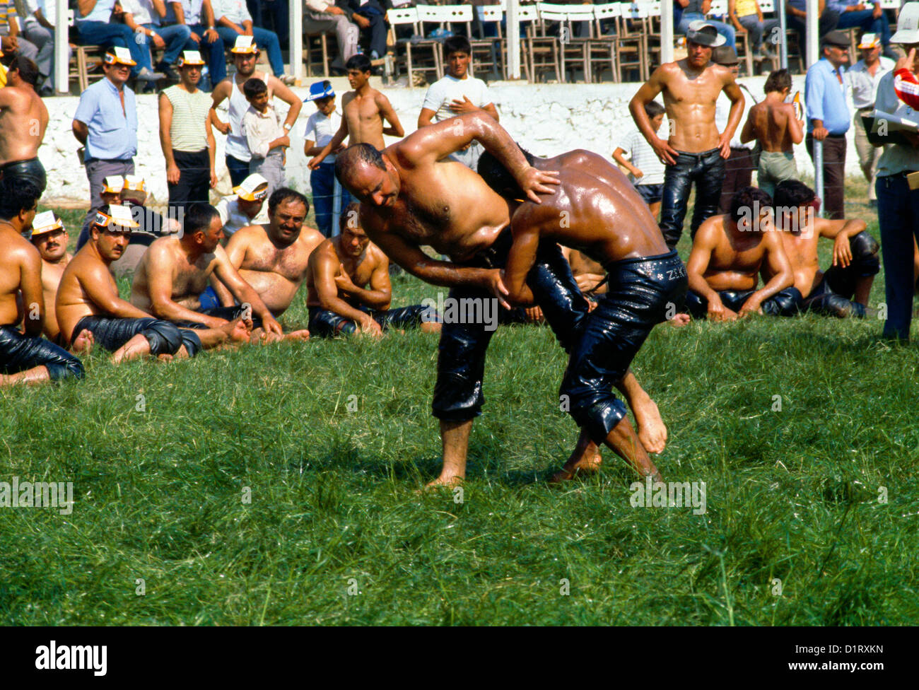 Edirne Turkey Men Covering Themselves With Olive Oil For Yagli Gures At Kirkpinar Tournament Stock Photo