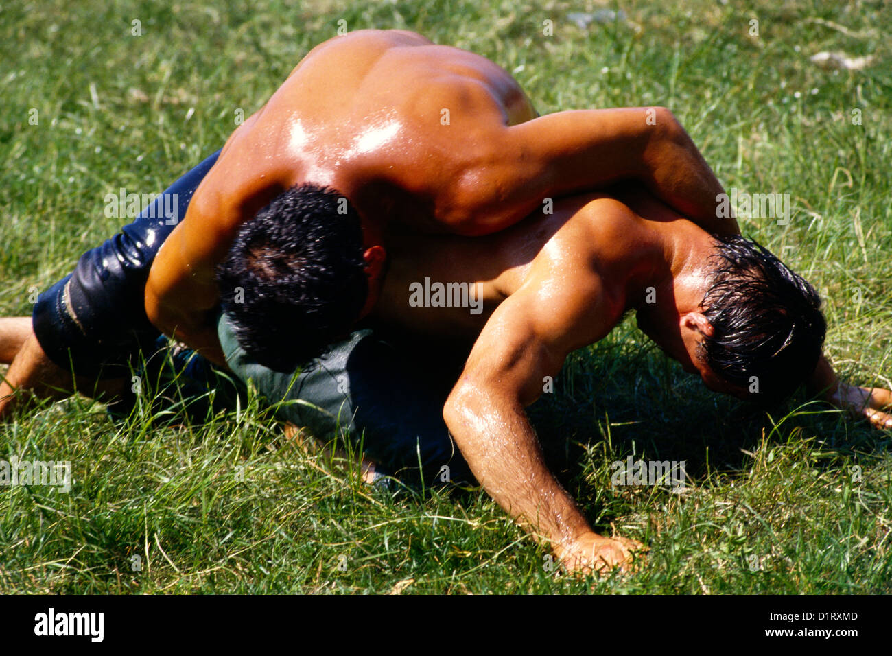 Edirne Turkey Men Covering Themselves With Olive Oil For Yagli Gures At Kirkpinar Tournament Stock Photo
