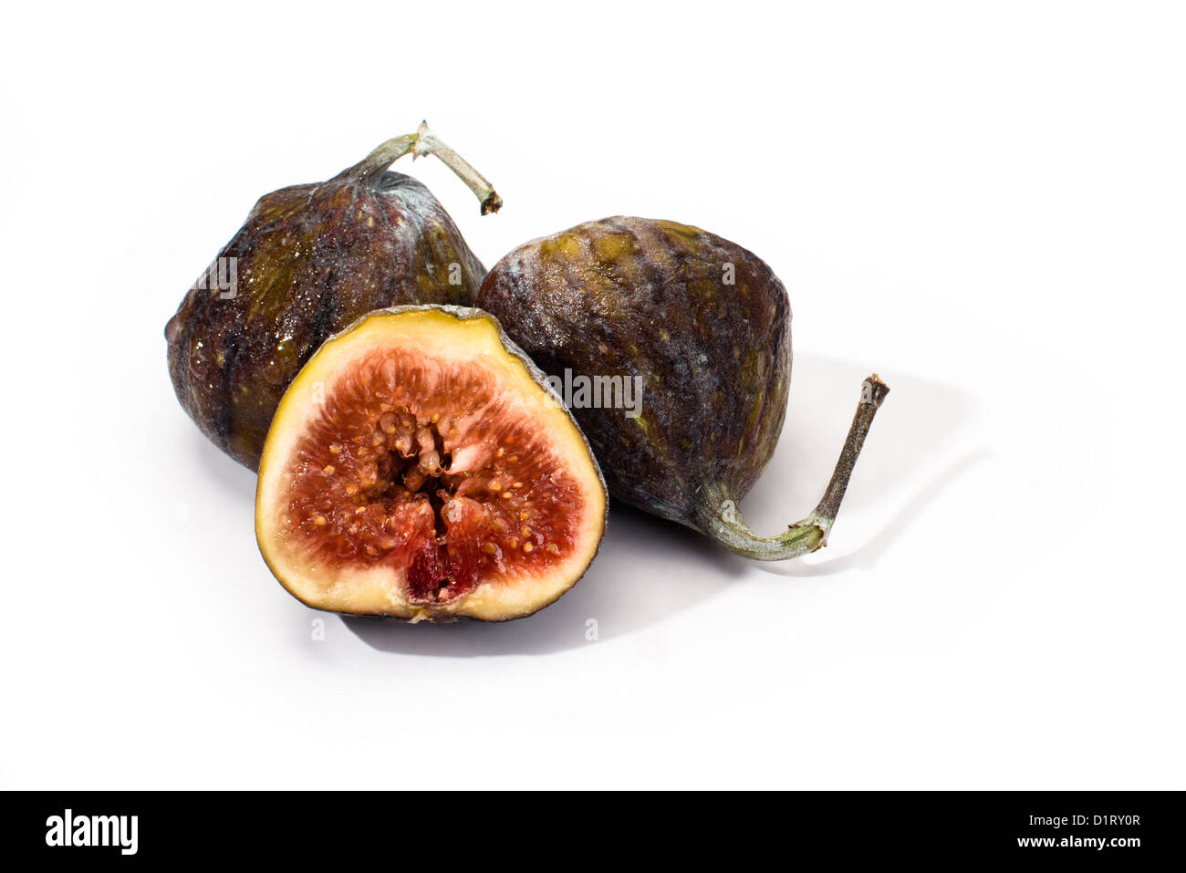 3 Ripe Figs several ripe figs isolated on a white background Stock Photo - Alamy