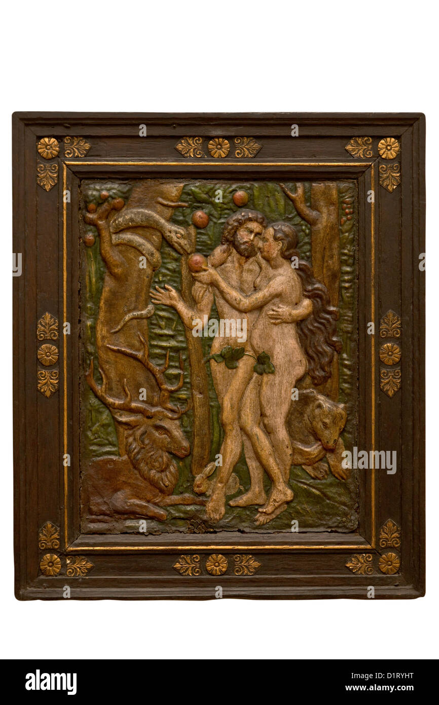 Old wood carved image of Adam and Eve in the Garden of Eden Stock Photo